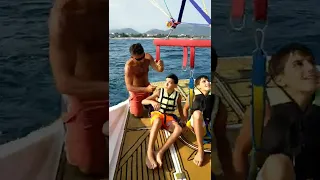 3 kids getting ready to fly Parasailing | Water Sports Antalya / Turkey