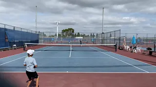 8 year old first Boys 16 Finals ethan, tennis player having fun and learning
