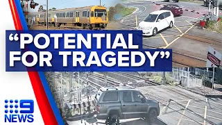 Drivers caught on camera smashing through railroad crossing gates | 9 News Australia