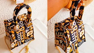 Ankara handbag. How to make one hand ankara bag with your black head sewing machine.