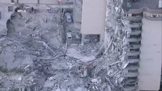 Security camera video shows moment condo building collapsed in Surfside, Florida