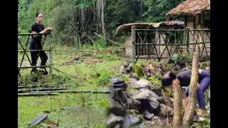 Girl makes a fence around the farm