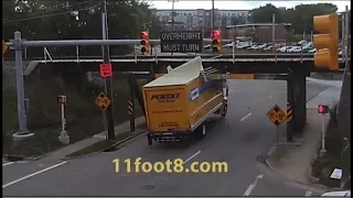 Speeding truck runs light and pops a wheelie at the 11foot8 bridge