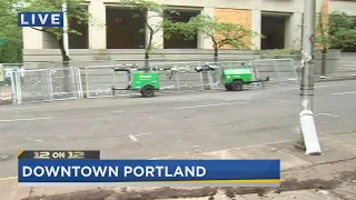 Police remove some fencing around Justice Center as protests for George Floyd continue