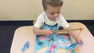 Apple Montessori Schools Toddler Singing While He Works