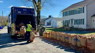 Waste Connections Garbage Truck VS Peak Week Bag Piles