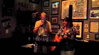 John Nolan singing at his Pub