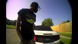 Body camera footage: Suspect killed by Sheriff's deputy while being pushed out of moving vehicle.