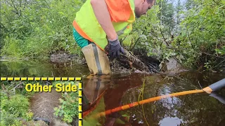 Completely Unclogging 36 Inch Plastic Pipe Plugged And Backing Up Stinky Water Flooding Over Road