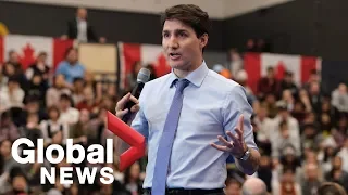 Justin Trudeau brushes off woman's question during town hall event