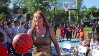 Basketball Hall-of-Famer, Olympian Nancy Lieberman takes a blind shot during dedication of DreamCour