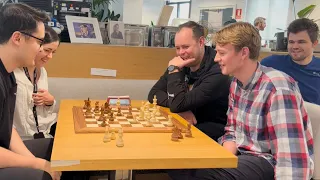 Magnus Carlsen Watches Brain&Hand Chess Game in the Office