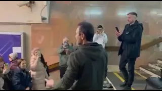 in Kharkiv, Ukraine, Svyatoslav Vakarchuk sings "Chervona Ruta"in the subway on Constitution Square.