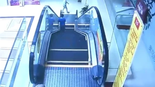 A boy is lucky to be alive afer falling several metres from an escalator