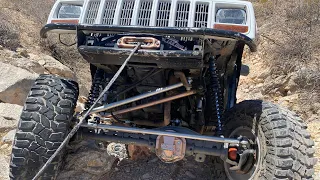 Daily driven 5 speed jeep xj on 37s vs 7ft wall