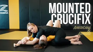 Americana and Straight Armbar from the Mounted Crucifix position.