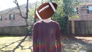 Troy Catches a Football