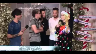 Niall kissing Harry under the mistletoe