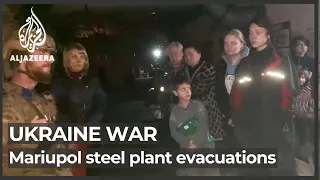 Ukraine war: Women and children evacuated from Mariupol plant