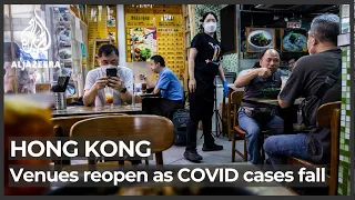 Hong Kong eases curbs, businesses reopen as COVID cases fall