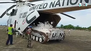 Indian Army BMP-2 unloaded from UN marked MI-26 helicopter