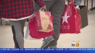 Last-Minute Shoppers Hit The Stores In Search Of Discounts