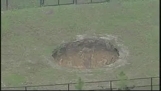 Hole reopens at site of deadly 2013 sinkhole