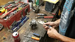 How to remove a Polaris 500 carb and clean the jet.