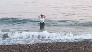 Graciously exiting the sea at Brighton Beach - swimming fully clothed in the sea ( sea swim)