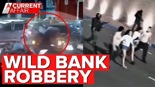 Hostages used as human shields in brazen bank heist | A Current Affair