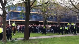 Wimbledon and MK Dons fans clash during their game yesterday