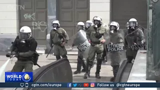 Protesters and police clash at Athens rail disaster demonstration