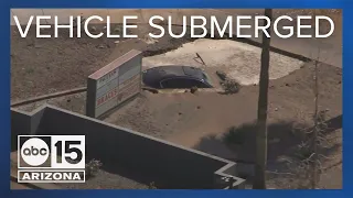 Car submerged after crash, apparent sinkhole near 75th and Virginia avenues in Phoenix