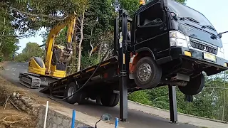 Story Line Loading And Unloading Excavator By Self loader Trucks.