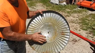 DIY Squirrel Guard-Repurposed Trash Can Lid