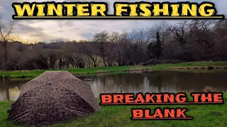winter fishing breaking the blank
