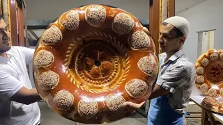the largest flatbread in the world in Uzbekistan 1 bread costs $100