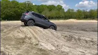 Nissan Rogue on sand off road