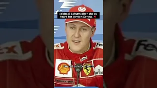 Michael Schumacher sheds tears for Ayrton Senna in a press conference.