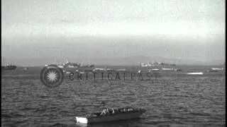 Japanese plane bombs USS Ommaney Bay and activities aboard USS Mississippi in Phi...HD Stock Footage