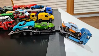 Model Cars and Trucks Slide going Down on Slide