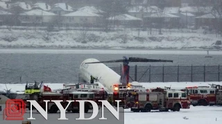 Plane at LaGuardia Airport skids off snowy runway