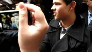 TAYLOR LAUTNER with fans outside the regis and kelly show