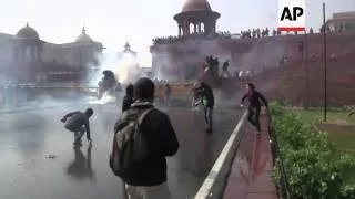 Police use tear gas, water cannons to disperse angry protest over gang rape