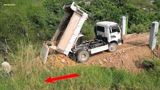 The New Project, FURUKAWA Dozer FD40P and 5 ton dump truck pour soil to rebuild the road