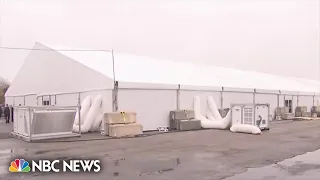 Controversial tent shelter for migrant families opens in NYC