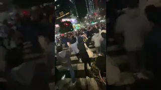 Japanese Football Fans Celebrate Along Shibuya Crossing After Historic World Cup Win