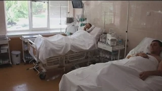 Victims of an Undeclared War: Ukrainian troops in hospital after major east Ukraine flare-up