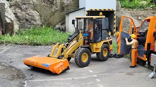 Damage cleanup after hail storm. RC excavator Liebherr A918, CAT loader, Truck Crane, Sweeper Truck