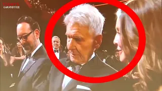 Awkward INDIANA JONES premiere! Harrison Ford wife had to seat behind